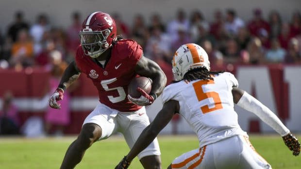 Oct 21, 2023; Tuscaloosa, Alabama, USA; Alabama Crimson Tide running back Roydell Williams (5) runs the ball against Tennessee Volunteers defensive back Kamal Hadden (5) at Bryant-Denny Stadium. Mandatory Credit: Gary Cosby Jr.-USA TODAY Sports  
